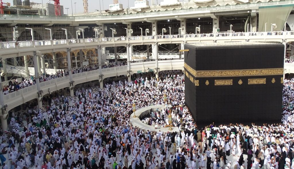 ka'bah in Makkah Mukarramah with people circumambulating it